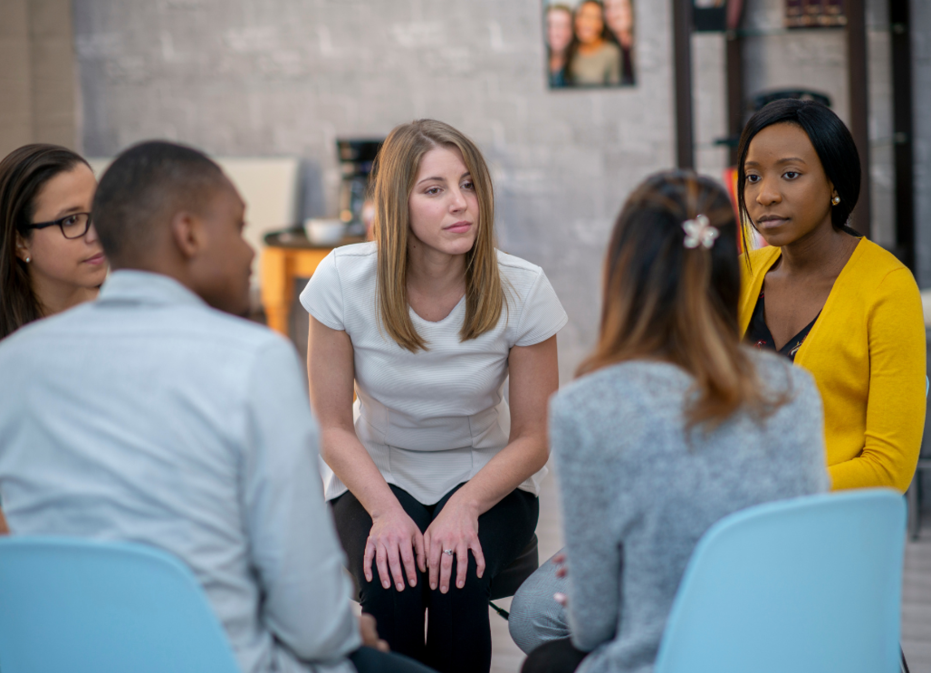 People in a Psychotherapy Session with a Psychologist